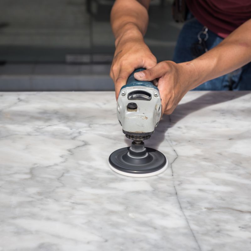 Expert assessing marble surface